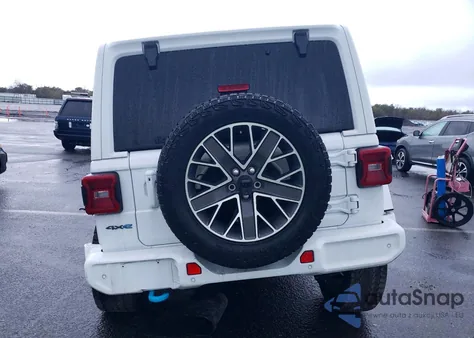 2024 Jeep Wrangler High Altitude 4Xe z USA, uszkodzony, nr VIN 1C4RJXU65RW143290